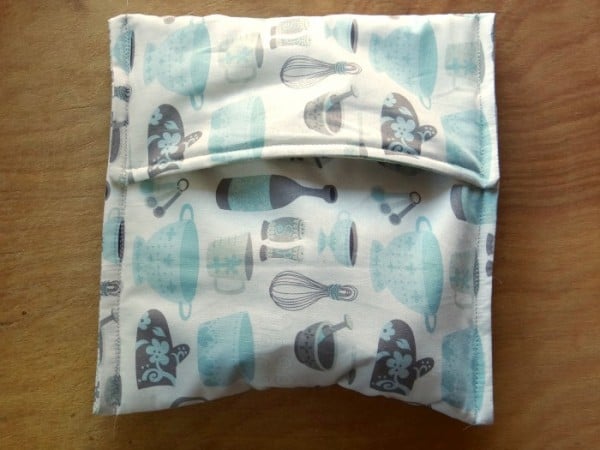 microwave potato cooker bag sitting on a wood counter