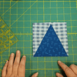 Learn how to sew up a fun quilt block that looks like skinny flying geese. Great for by itself or in a larger quilt block. Video tutorial instructions.