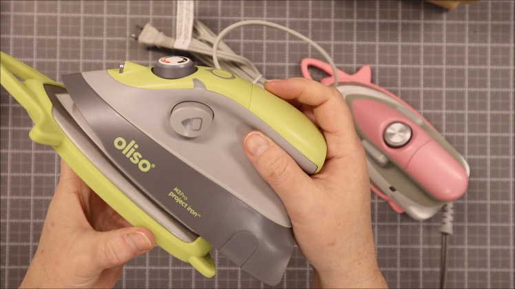 Inside: You'll see the mini Oliso iron in action. It's a great iron, hot and the perfect size for travel or getting into those tricky point areas with that tip! Full video walk through!