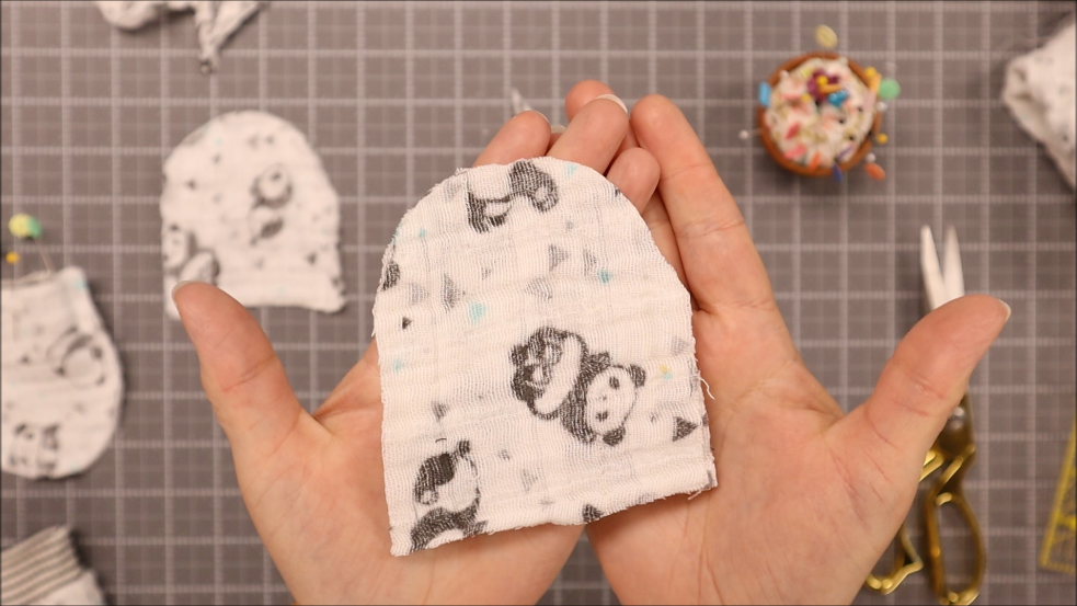 6- This is what it will look like when it's cut. You can use your first cut to be the template for the second hand mitten. 