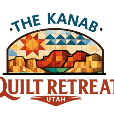 Logo for "The Kanab Quilt Retreat Utah" featuring a quilt pattern with a red star, blue triangles, and canyon landscape in warm colors, all enclosed in an arch shape—celebrating the spirit of Quilt Retreats in Southern Utah.