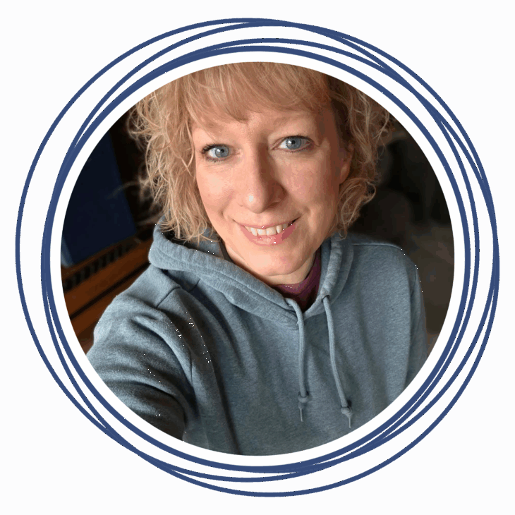 A person with short, curly blonde hair and blue eyes smiles at the camera, wearing a gray hoodie. Blue circular lines frame the image, echoing the creative energy of a quilting summit on a light background.