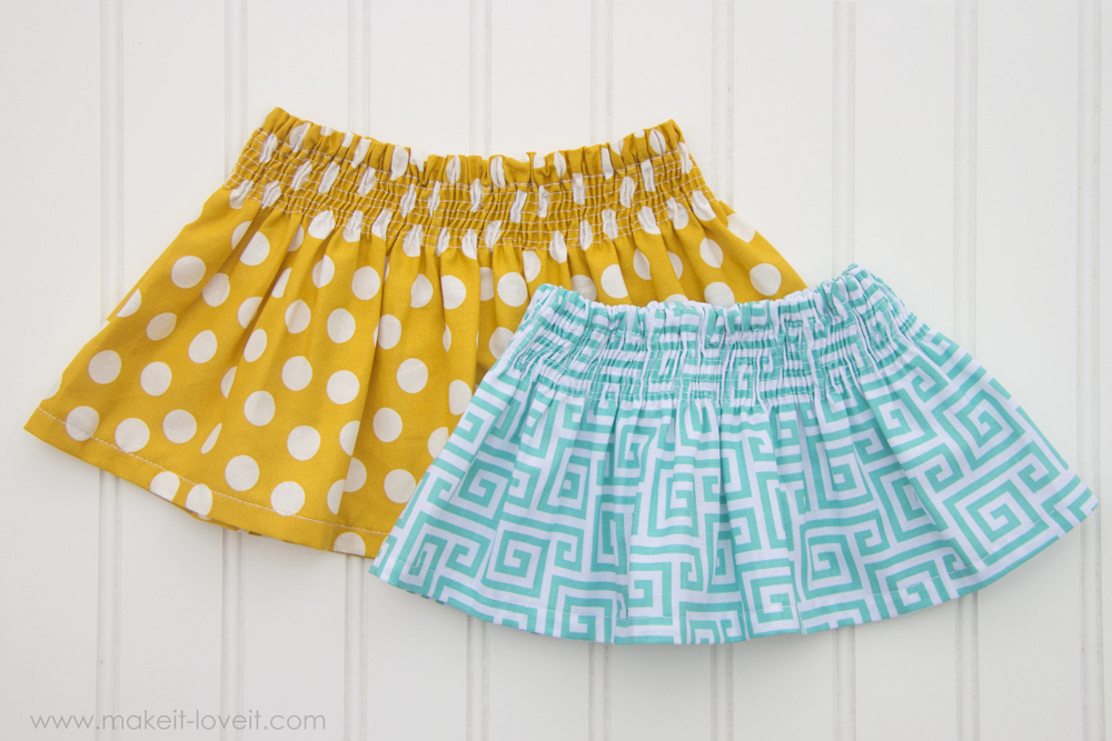 15 Easy Elastic Waist Skirt Patterns You Can Sew Today (All Free) 15 Two small, elastic-waist skirts—one yellow with white polka dots and one blue with a white geometric Greek key pattern—are laid flat on a white background, perfect for anyone looking for easy skirt sewing inspiration or exploring new elastic waist skirt patterns.