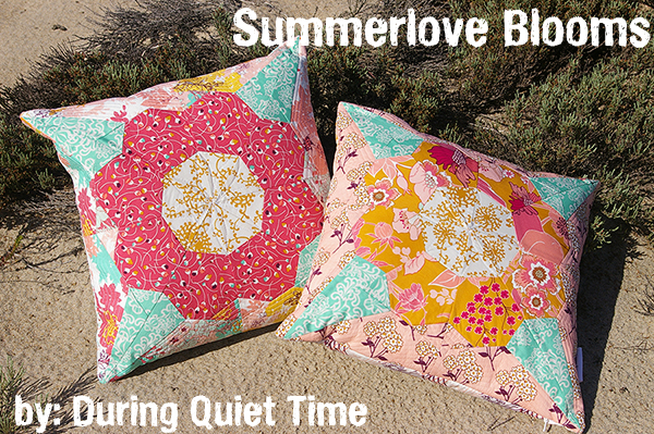 Refresh Your Home with These Summer Pillow Sewing Ideas (free patterns) 9 Two colorful quilted pillows with floral patterns lie on the ground outside, making a charming statement in summer pillow sewing and home decor. Text reads “Summerlove Blooms” at the top and “by During Quiet Time” at the bottom. Bushes are visible in the background.