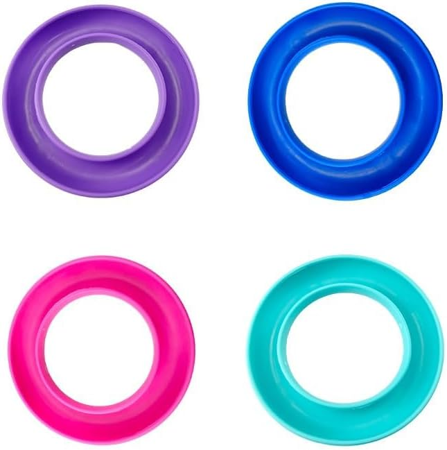 Bobbin Storage Ideas That Will Finally Keep Those Threads Under Control 6 Four colorful rubber rings, perfect for thread organization or bobbin storage, are arranged in a square pattern on a white background. The colors are purple (top left), blue (top right), pink (bottom left), and teal (bottom right)—a bright addition to your sewing room ideas.