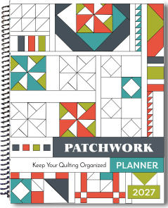 Spiral-bound 2027 patchwork planner featuring a geometric quilt block cover design.