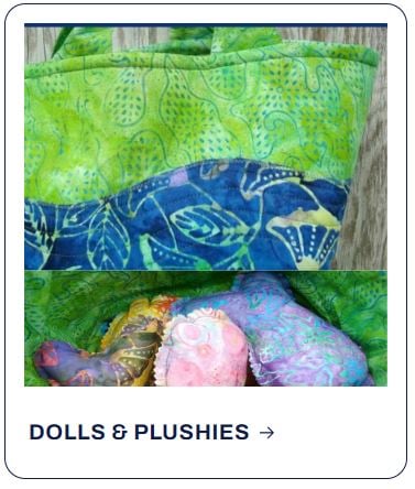 A fabric tote bag with green and blue patterns, similar to those seen on our planners, containing several colorful plush toys with the text “DOLLS & PLUSHIES” below.